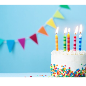Birthday cake with candles and bunting